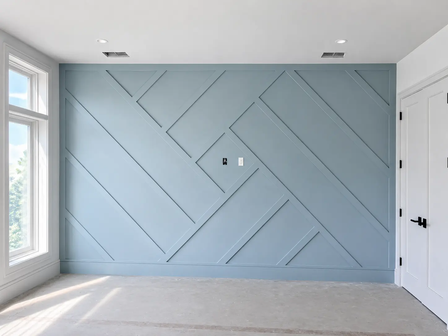 Geometric accent wall paneling by Forben Construction